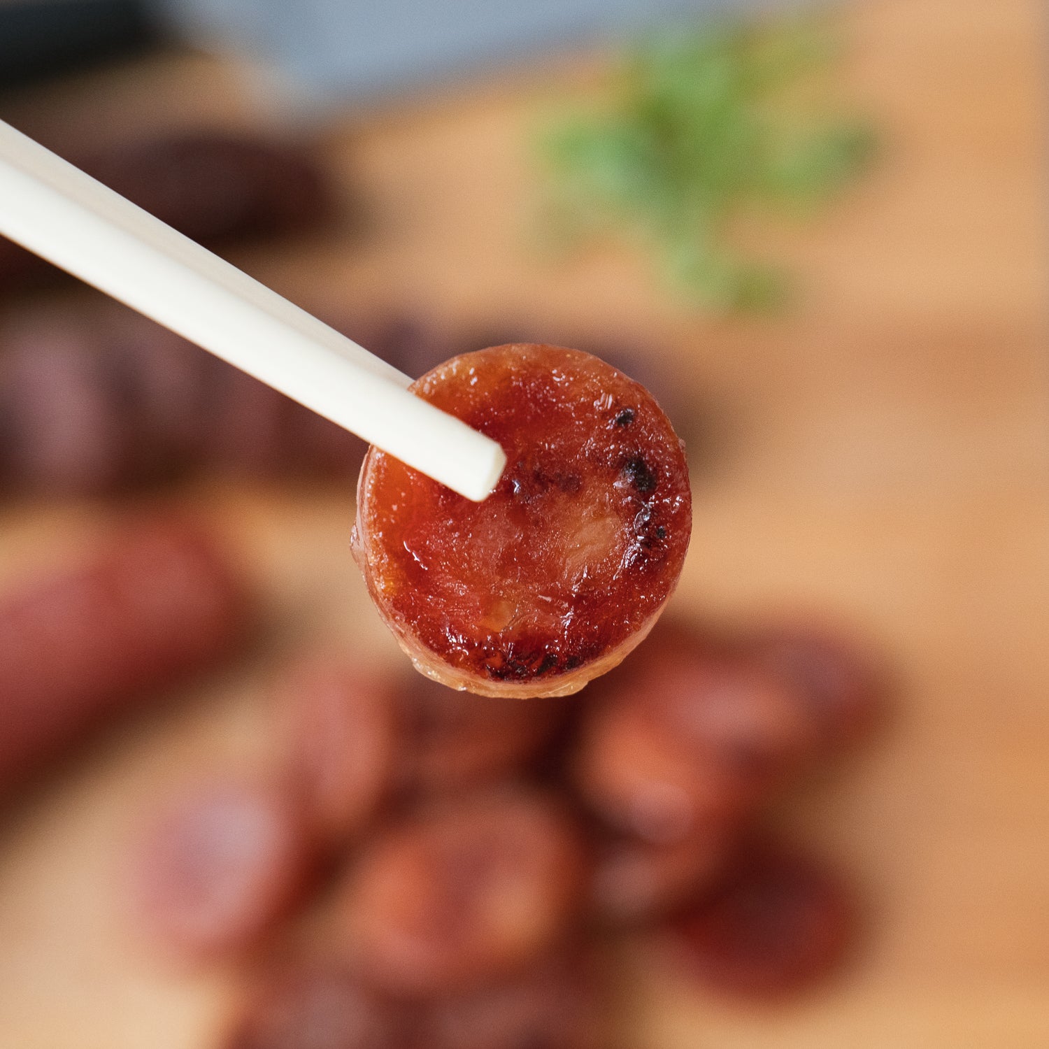 close-up shot of a sliced piece of quang tran chinese sausage