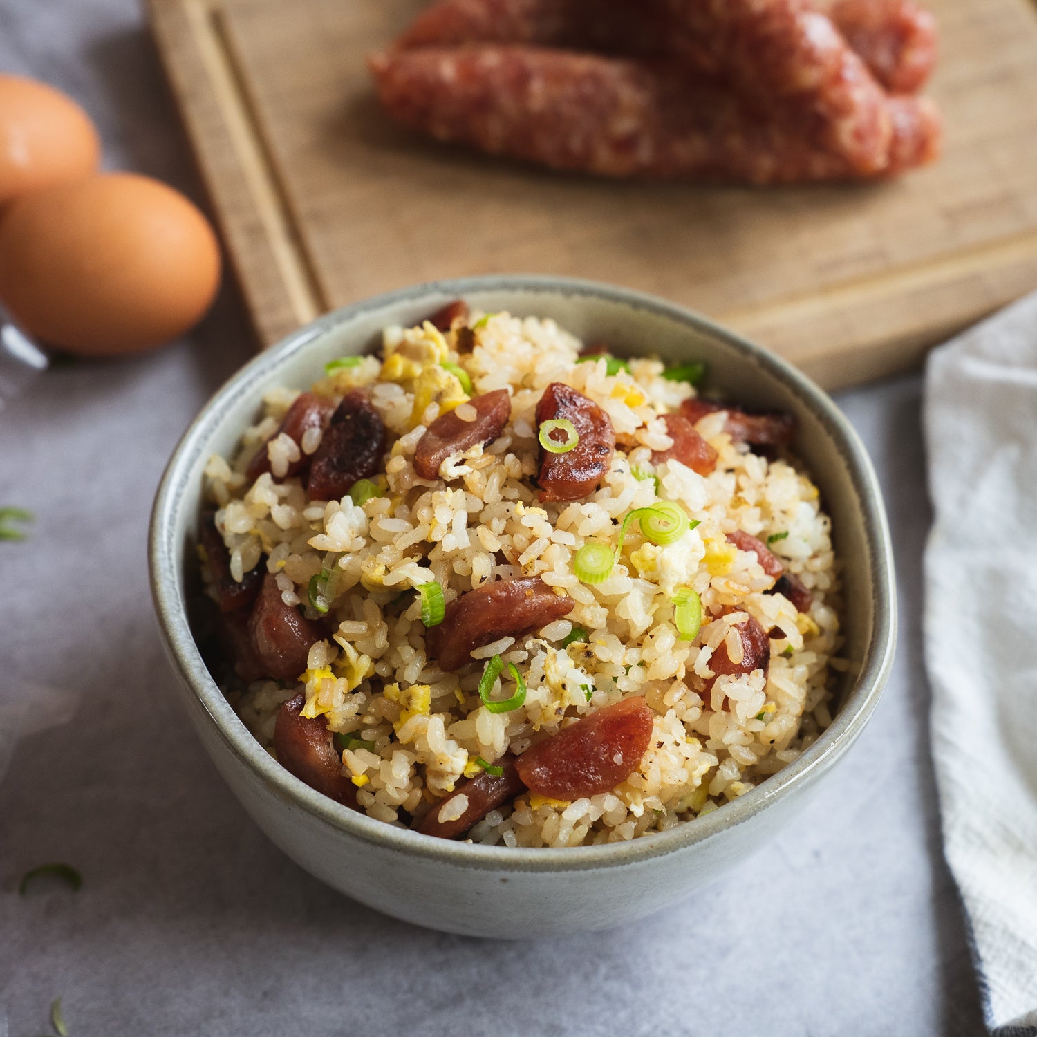 bowl of fried rice with quang tran chinese sausages