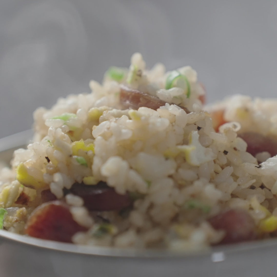 Load video: a family recipe video about how to make fried rice with quang tran sausages